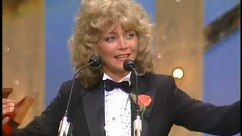 Mickey Gilley presents Barbara Mandrell with the 1...