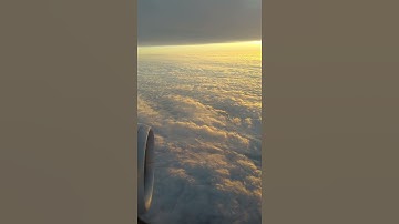 AIRPLANE SCENERY FROM ABOVE CLOUDS ! WINDOW ! VIEW