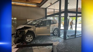 No one injured in crash into Corvallis bank