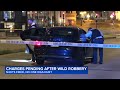 Suspect jumps into fleeing armed robbery victim's car in the Loop, fires gunshot: police