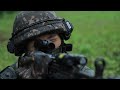 Us and south korean infantry soldiers train in the pouring rain