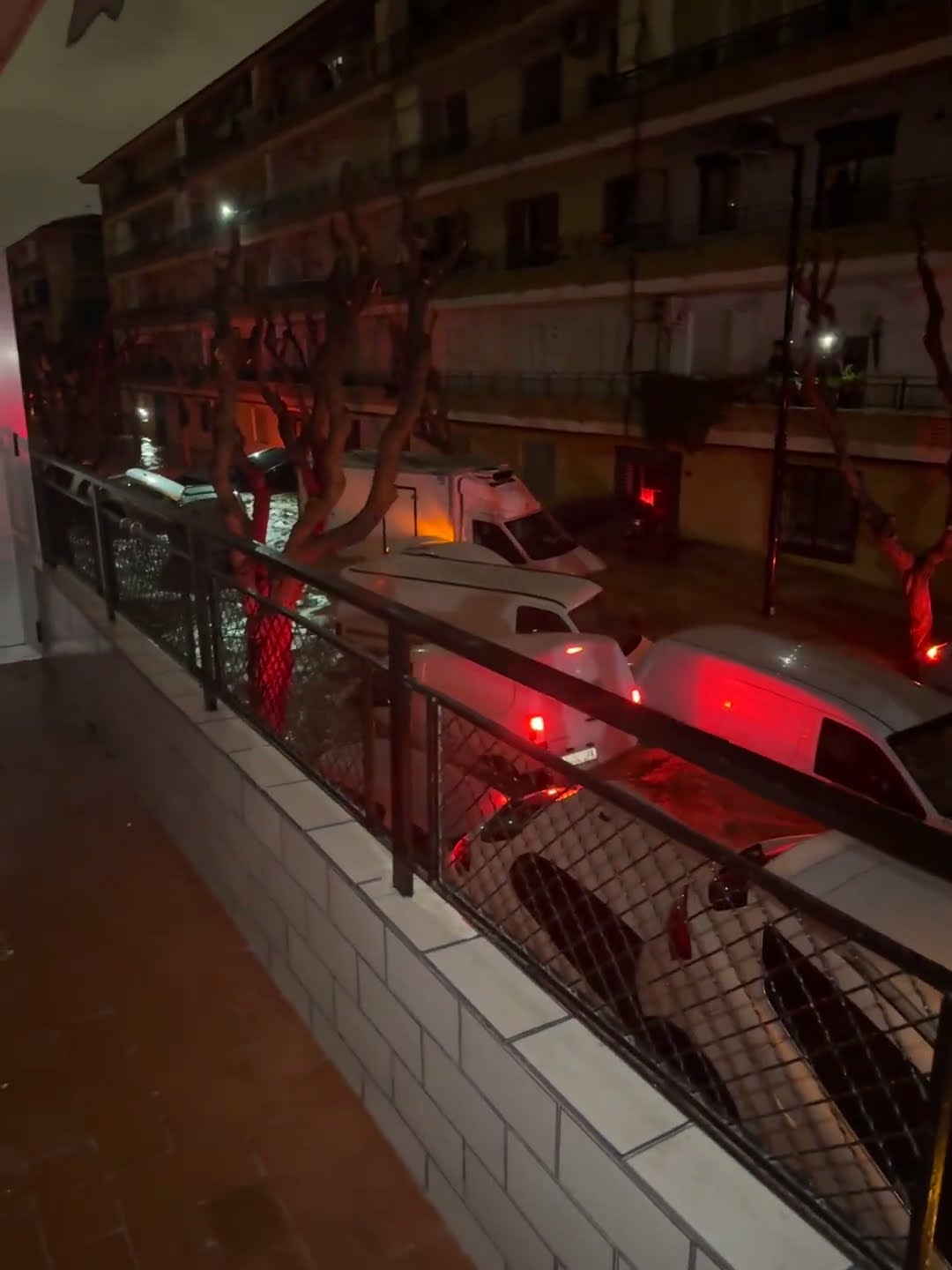 Severe Flooding Submerges Cars on Spanish Streets at Night