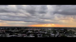 Thick Gray Clouds and Golden Sunrays Sunset (time-lapse)