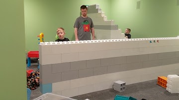 Kids building an Everblock wall