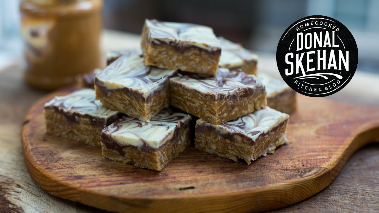 ⁣Peanut Butter Snicker Squares feat. MyCupcakeAddiction!