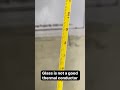 Glass is not good Thermal Conductor.See the Thermometer reading While water is Boiling