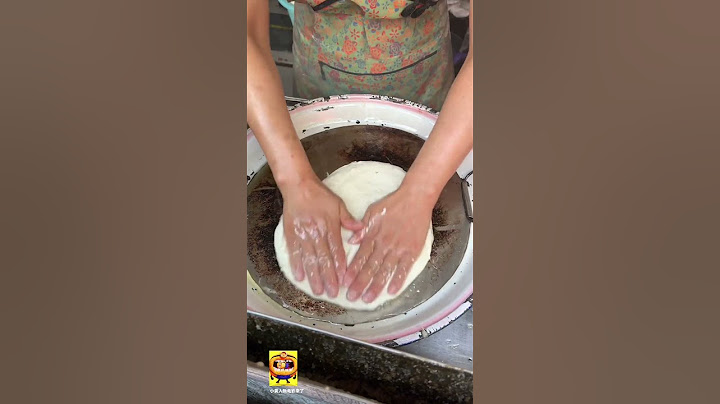 河南郑州特色油饼，5元一张，徒手摊饼堪比铁手，味道挺不错 #在路边摊感受人间烟火 #抖音美食推荐官 #路边摊美味 #郑州美食 #神偷奶爸4  @电影神偷奶爸4