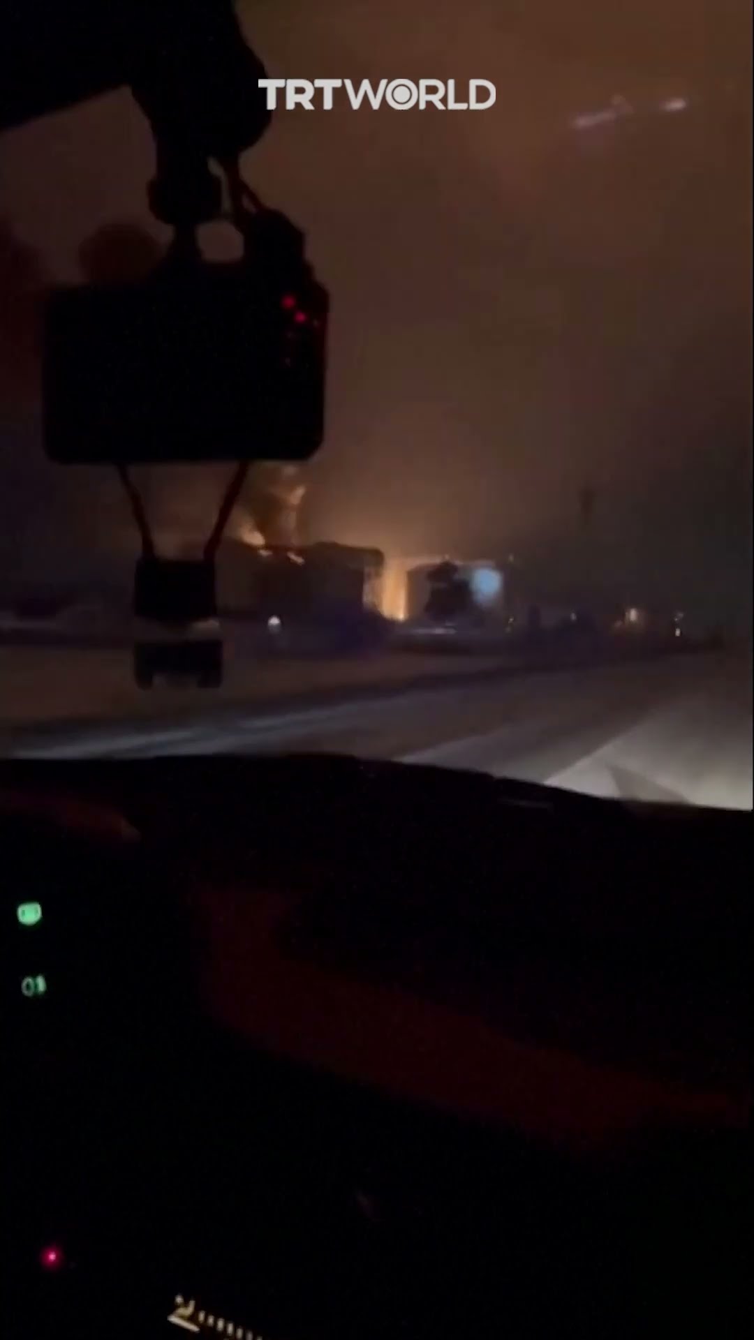 Debris from falling Ukrainian drones sparks fire at Russian oil storage site