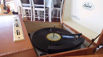 Capitol Hi-Fi record player playing LP records