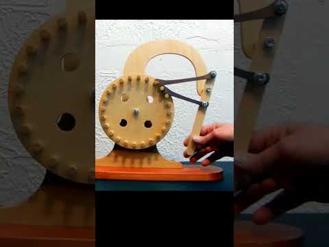Видео: Wooden hand lever that activates the 15 degree rotary dispenser