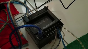 SISTEM ESKALATOR OTOMATIS MENGGUNAKAN CX PROGRAMMER DAN CX DESIGNER