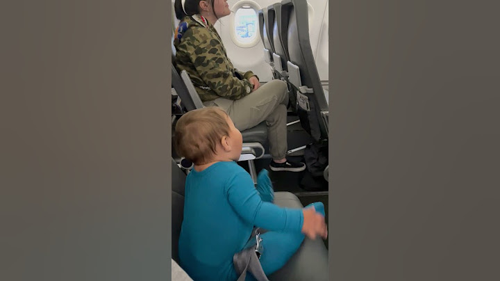 10-month-old delights passengers on delayed flight