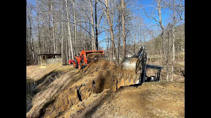 Replacing a washed out culvert part 1, pond dam repair.