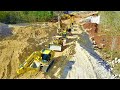 Excavators And Dozers Digging Cutting Limestone Hill For The New Road Construction