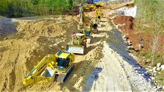 Excavators And Dozers Digging Cutting Limestone Hill For The New Road Construction