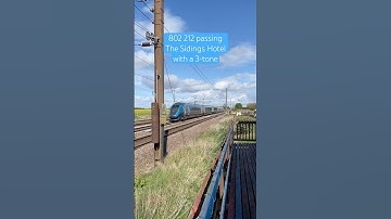 TPE Class 802 passing The Sidings Hotel