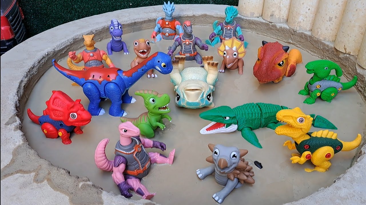 Plastic Dinosaurs Stuck in the Mud Triceratops Parasaurolophus