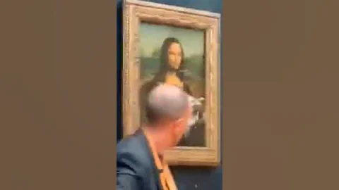 Mona Lisa Attacked With Cake By Man Disguised As Old Women