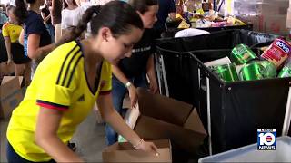 Environmental Miami-Dade's Global Empowerment Mission volunteers pack donations for Colombia Camera Feed