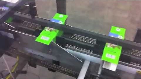 Econocorp Spartan Cartoner with Autoload of Bucket Conveyor | ProPac.com