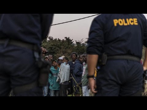South African police and soldiers confiscate looted items