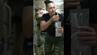 Astronaut drinks floating water in Space