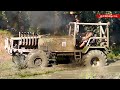 Mud show  monster tractor stuck in the mud  most smoking  amazing diesel engine song