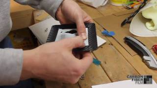 Guide for installing 3M carbon fiber DI-NOC on a lightswitch plate from CarbonFiberFilm.com