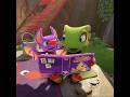 A green reptile, a purple bat, Are plotting something... fancy that!