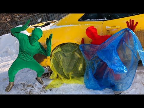 Red Man in Raincoat Taped up Wheelbarrow Tires VS Green Man on Chevrolet Camaro 13+
