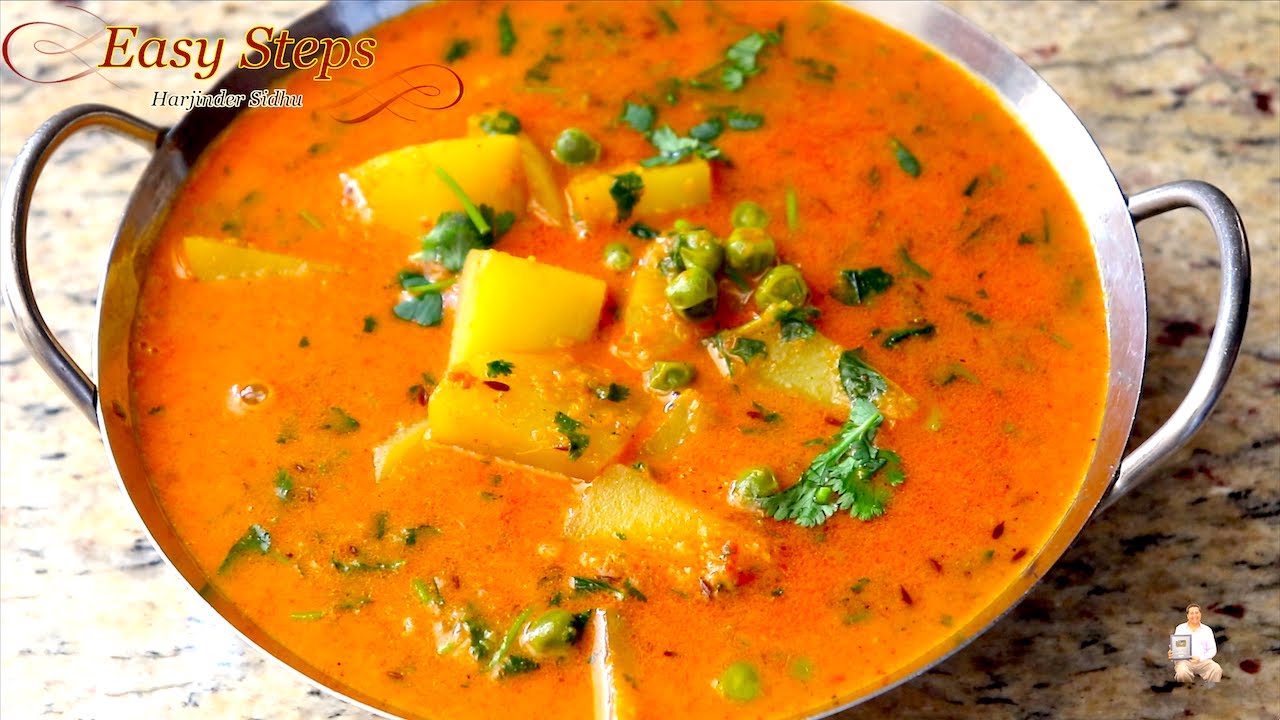 Potato and peas curry in coconut milk gravy