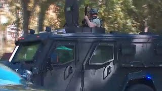 Officer shot in Sandy Springs SWAT standoff; suspect surrenders, police say
