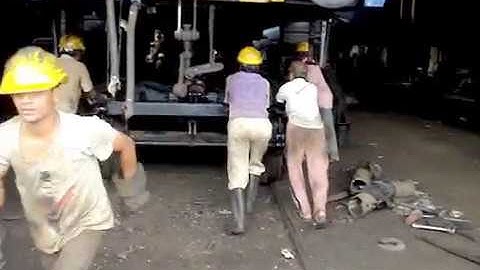 Railway Trolley Placement under the Coach from the Traverser