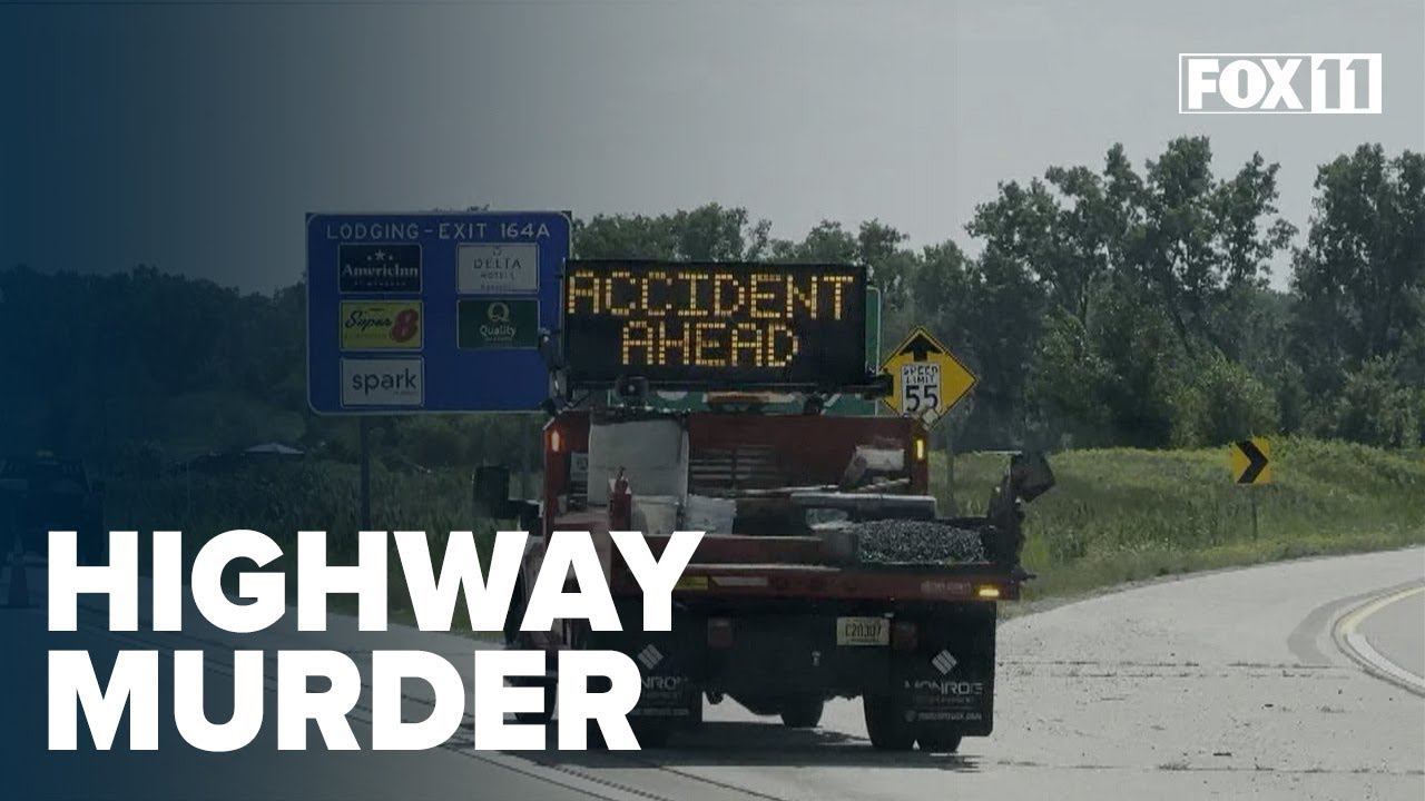 Man with gun arrested after dead body found in crashed vehicle along ...