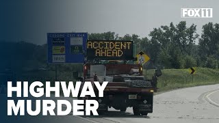 Man with gun arrested after dead body found in crashed vehicle along Wisconsin highway