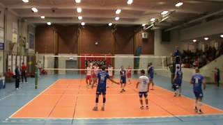 Right side hitter. Blue T-shirt.