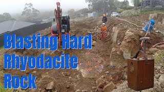 Blasting Hard Rhyodacite Rock on a new home site. (4K)