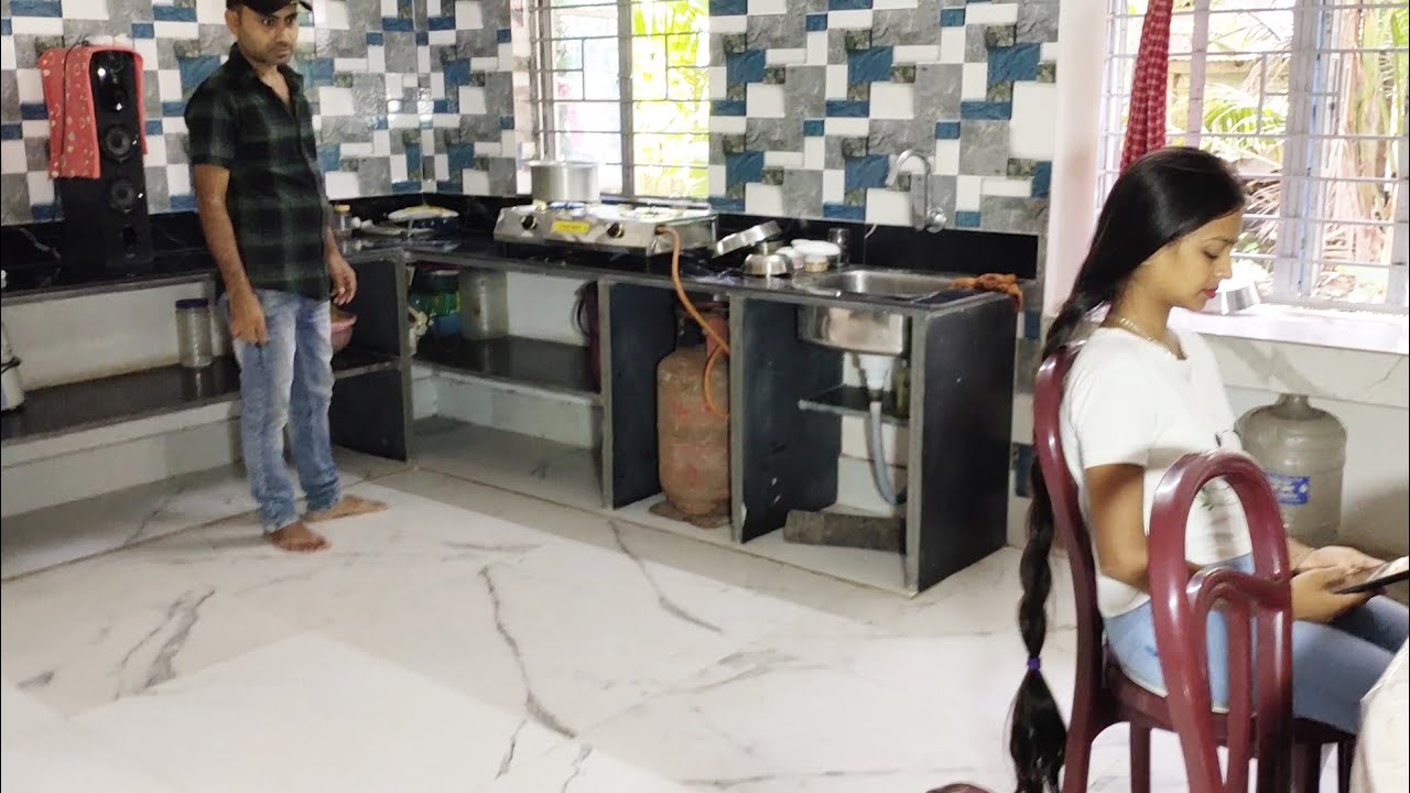 The electrician really likes the lady's long hair. || Hair Play || long hair braid