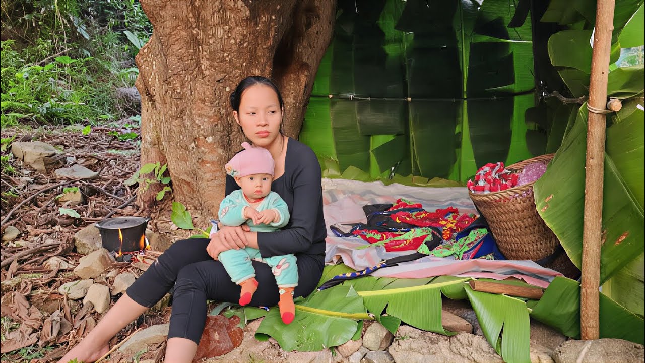 A Mother’s Strength: Homeless Woman Caring for Her Child Under a Tree