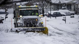 Snow showers taper off overnight