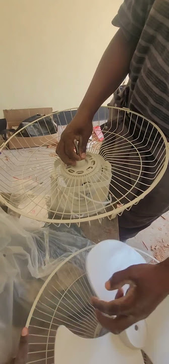 Assembling a ceiling fan/kufunga feni mpya#simple #electricalconnection #electricaltips