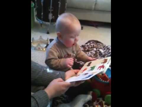 laughing-baby-reading-a-book