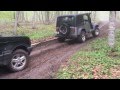 Range rover towed by jeep wrangler