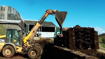 Loading and Spreading Muck - Massey and JCB action.