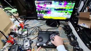 PS3 Super Slim 4001C Testing Disk Drives While Seeing Through the View of Garbled Video