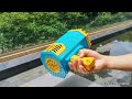 How to Use Bazooka Bubble Gun - Bubble Machine with 69 Holes and Light Mp3 Song