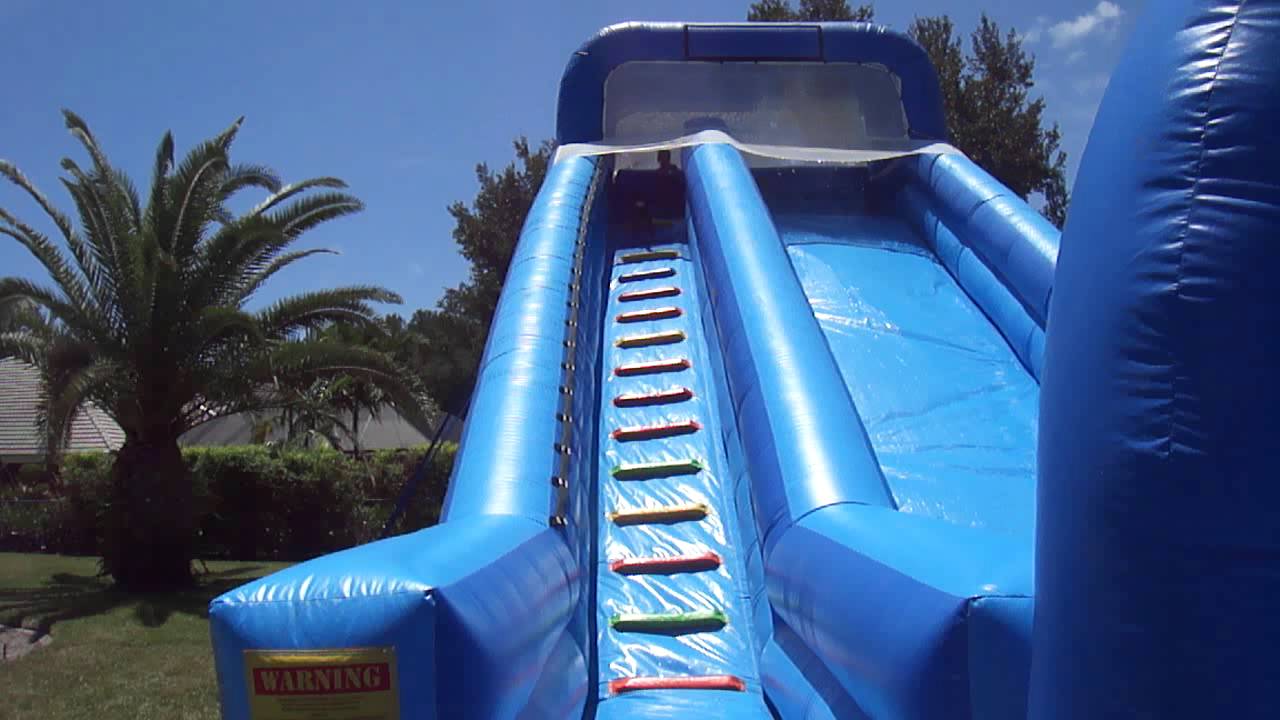 Dogs on a Jumbo Water Slide - YouTube