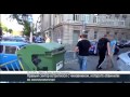 In Odessa,Ukraine, Activists of Right Sector throw corrupt official into the trash bin