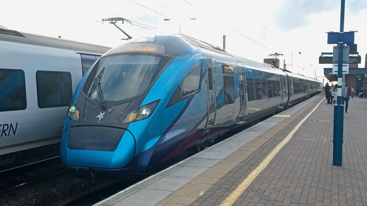 Transpennie express class 397 003 arriving and departing Wigen North ...