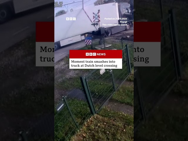 Moment train smashes into truck at Dutch level crossing. #Netherlands #Shorts #BBCNews